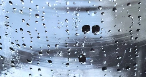 Tiny Drops of Water on Glass Surface Stock Footage 121443644