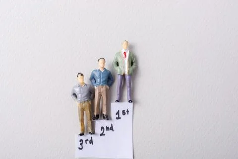 Tiny figurine of man miniature model in view 库存照片