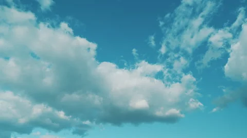 Tiny Fluffy Clouds In Sunny Day. Puffy Fluffy White Clouds. Cumulus Cloud Stock Footage 264956409