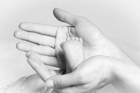 Tiny foot Stock Photos