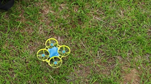 Tiny FPV Drone Takes Off. Whoop drone, whoop racing Stock Footage 252368994