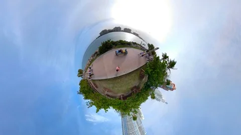 Tiny globe miniature planet Miami Beach Florida Smith Wollensky Stock Footage 85772180