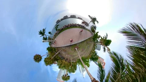 Tiny globe miniature planet Miami Beach Florida South Pointe Park Stock Footage 85772257