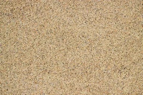 Tiny grains of sand macro close up texture. Photos