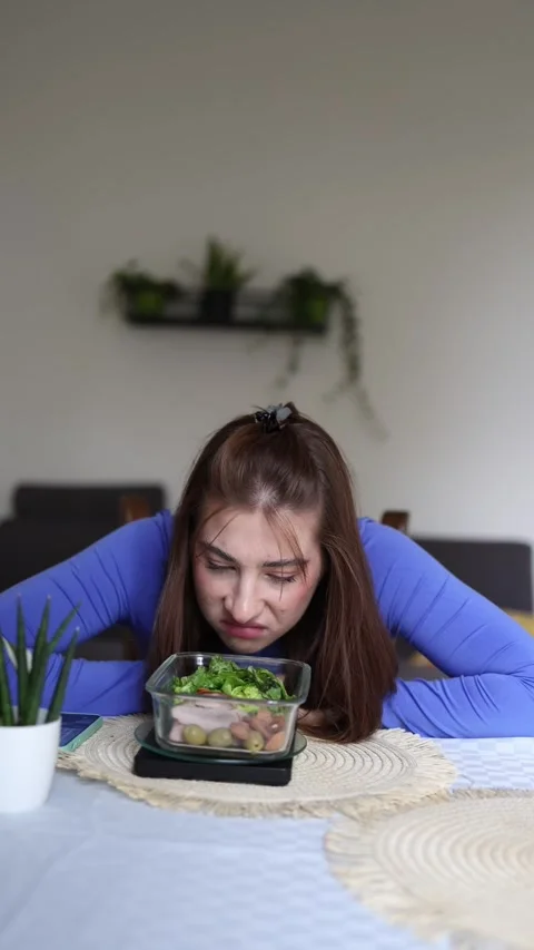 Tiny healthy meal leaves her frustrated Stock Footage 339855200