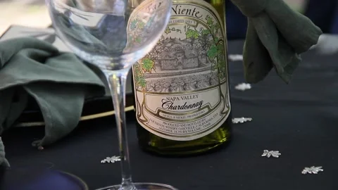 Tiny hemp leaf pins around wine bottle Stock Footage 150802854