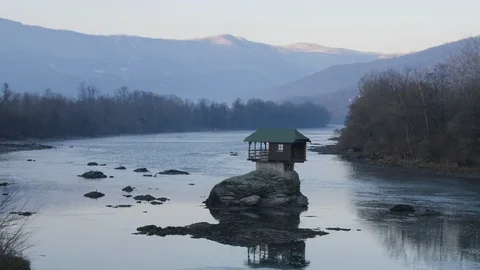 A Tiny Home Built on a Rock on the River Drina in Bajina Basta, Serbia Stock Footage 90101791