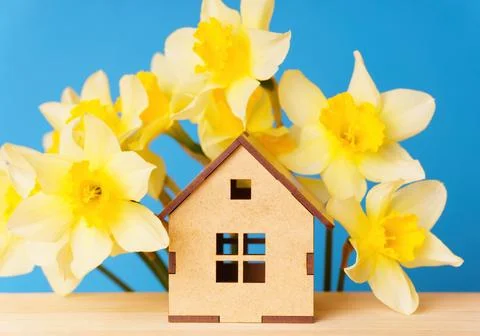 Tiny House and Spring Flowers: Dreaming of a Cozy Retreat Stock Photos