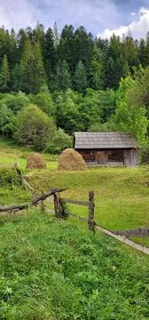 Tiny house in the carpathian mountains Stock Photos