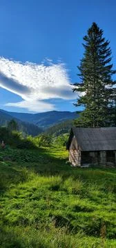 Tiny house in the carpathian mountains Stock Photos