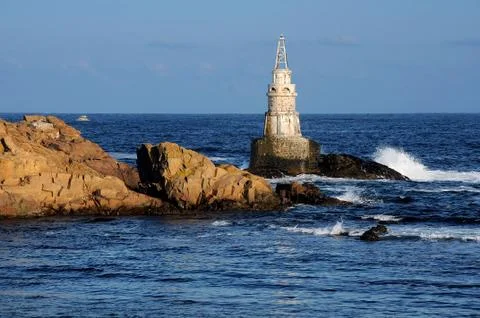 Tiny lighthouse in the town of Akhtopol Stock Photos