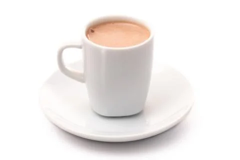 A Tiny LIttle Mug Filled with Hot Chocolate for a Child called a Babyccino Stock Photos