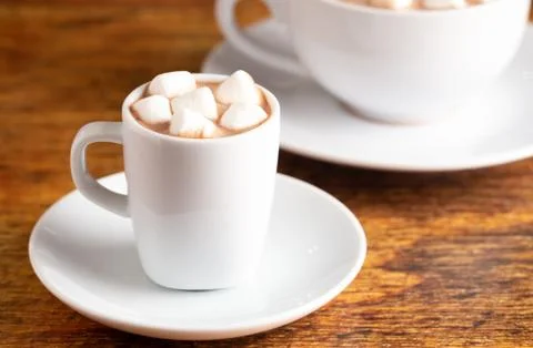 A Tiny LIttle Mug Filled with Hot Chocolate for a Child called a Babyccino Stock Photos