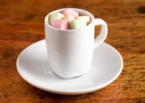 A Tiny LIttle Mug Filled with Hot Chocolate for a Child called a Babyccino Stock Photos