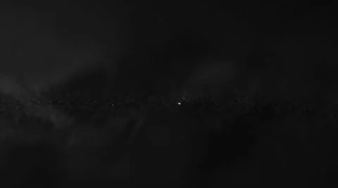 Tiny little white crystals drops on a black surface Stock Footage 67821329