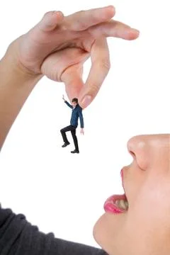 Tiny Man Being Held By A Gigantic Woman Stock Photos