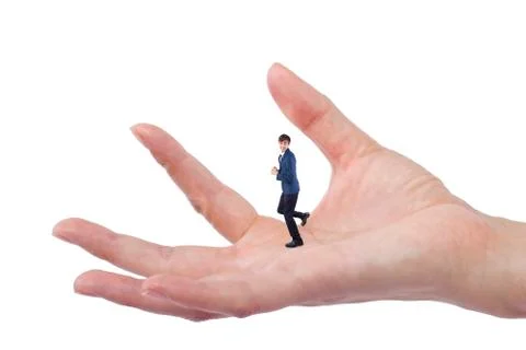 Tiny Man Being Held By A Gigantic Woman Stock Photos