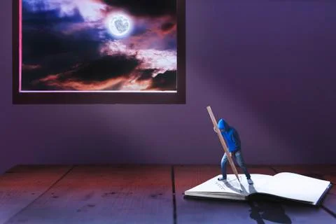 Tiny man writing heart on book among light of full moon Stock Photos