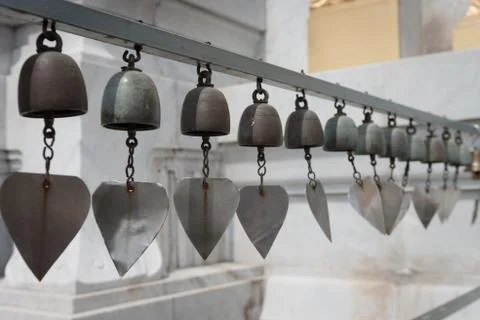 Tiny Metal Bells as Wind Chimes Stock Photos