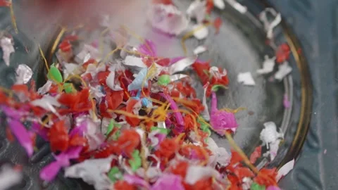 Tiny microplastic specks drop into a sample container, arranged in slow mot.. Stock Footage 289844088