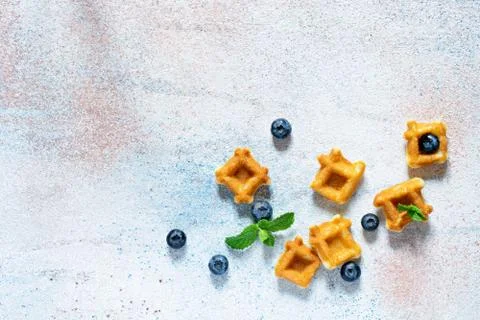 Tiny (Mini) waffles for breakfast with berries Foto stock