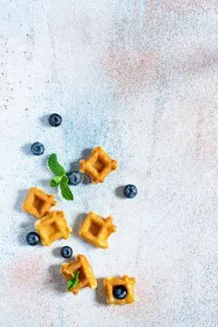 Tiny (Mini) waffles for breakfast with berries Foto stock