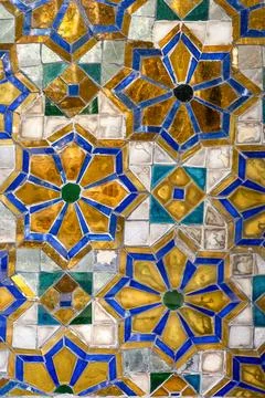 Tiny mirror pieces and gold surfaces show careful exterior work from the Ra.. 스톡 사진