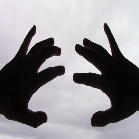 Tiny movements of two hands on a window-pane Video stock 69521284