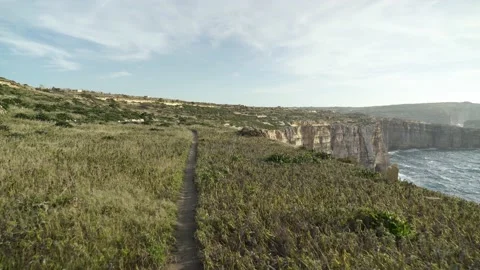 Tiny Narrow Path near Coastline of Mediterranean Sea in Island of Malta Video stock 169952884