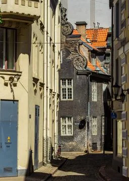 Tiny old Riga brick street and architecture Stock Photos