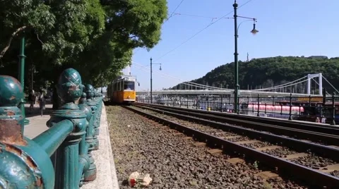 Tiny orange and white train flies by on tracks 動画素材 67185141