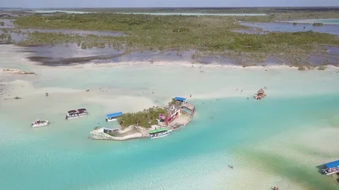 Tiny Party Island on Small Bright Blue Lagoon River Canal in Mexico Video stock 89881269