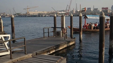 Tiny Passenger Ferry Boat Arrives and Unloads Passengers at the Pier 動画素材 74629138