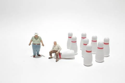 A tiny of people Figurines and Bowling Ball 写真素材