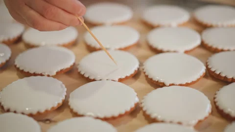 Tiny pie decoration. Skilled hands adorn miniature pie treats rhythmically Stock Footage 346389691