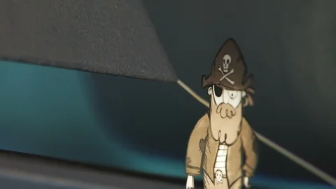A tiny pirate character made out of paper commanding his ship to attack. 4KHD Stock Footage 110123870