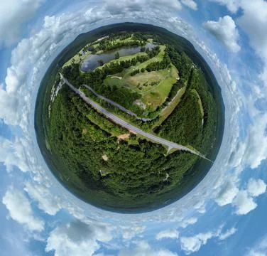 Tiny planet above golf course Fotos Stock