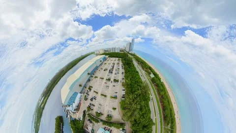 Tiny planet aerial drone footage Haulover Beach Miami Florida 2026 Stock Footage 336211990