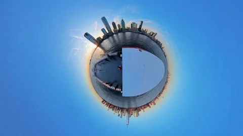 Tiny planet aerial of ferry on Hudson River with New York skyline at sunset, USA 動画素材 304318699