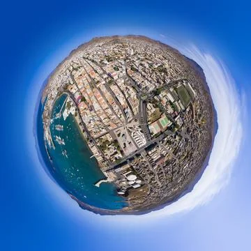 Tiny planet Aerial panoramic view of Mindelo waterfront in Sao Vicente Isla.. Stock Photos