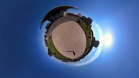 Tiny Planet –  building on  Tongdaewn Street in Pyongyang- 360° Stock Footage 99844163