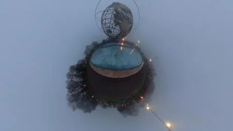 A tiny planet drone view of the iconic Unisphere in Flushing Meadows Corona Stock Footage 333341898