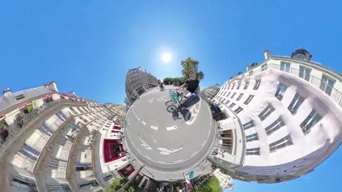Tiny Planet Effect - Man Biking In The Street Of Paris In Summer. - Stock Footage 317060450