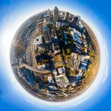 Tiny Planet effect in Midtown Atlanta  during sunset with sun rays Stock Photos