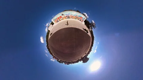 Tiny Planet –  Large billboard with the leader in Pyongyang Stock Footage 99842129