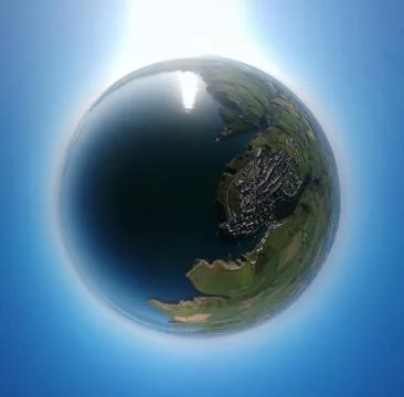 Tiny Planet of Port Isaac in Devon, shot from the air showing the coastline Stock Photos