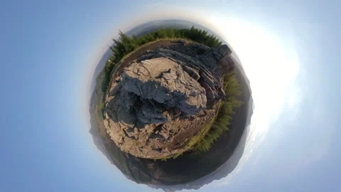 Tiny Planet Rocky Mountains Landscape seen from a Peak at Sunrise Video stock 141226592