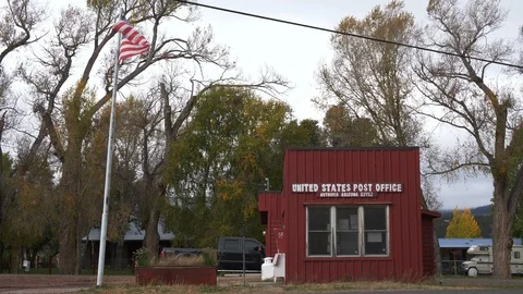 A tiny post office in the small town of Nutrioso, Arizona Stock Footage 97116414