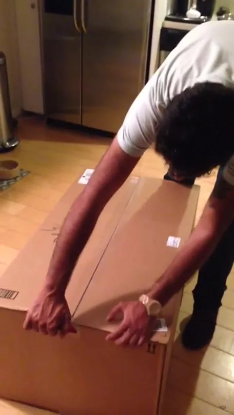 Tiny product delivered in a massive box Stock Footage 272880399