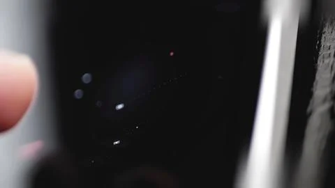Tiny red, white, and blue tracked objects appear along faint curved paths Фото